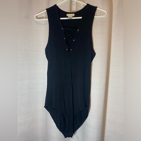 EUC Wet Seal black bodysuit! Simple cute design and easy wear. - Picture 1 of 3